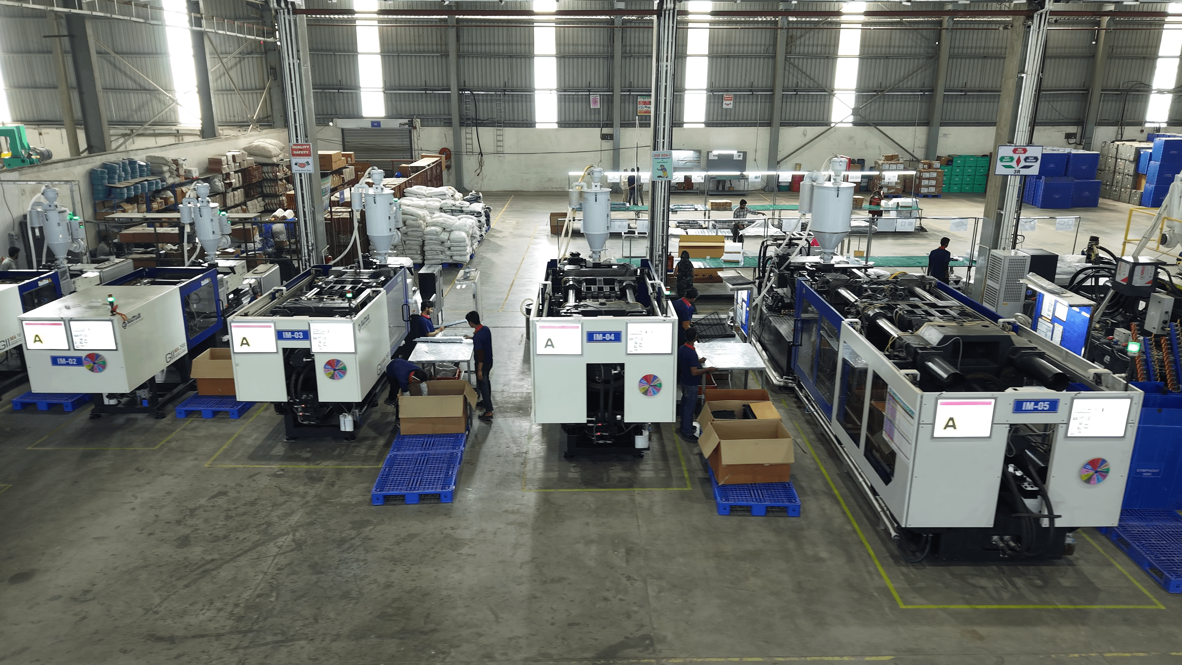Injection-moulding machines inside the Pixelplast production facility